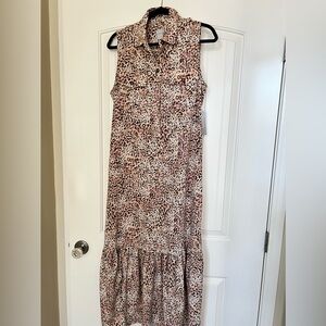 Chico’s New sleeveless maxi safari animal print with soft beige background.